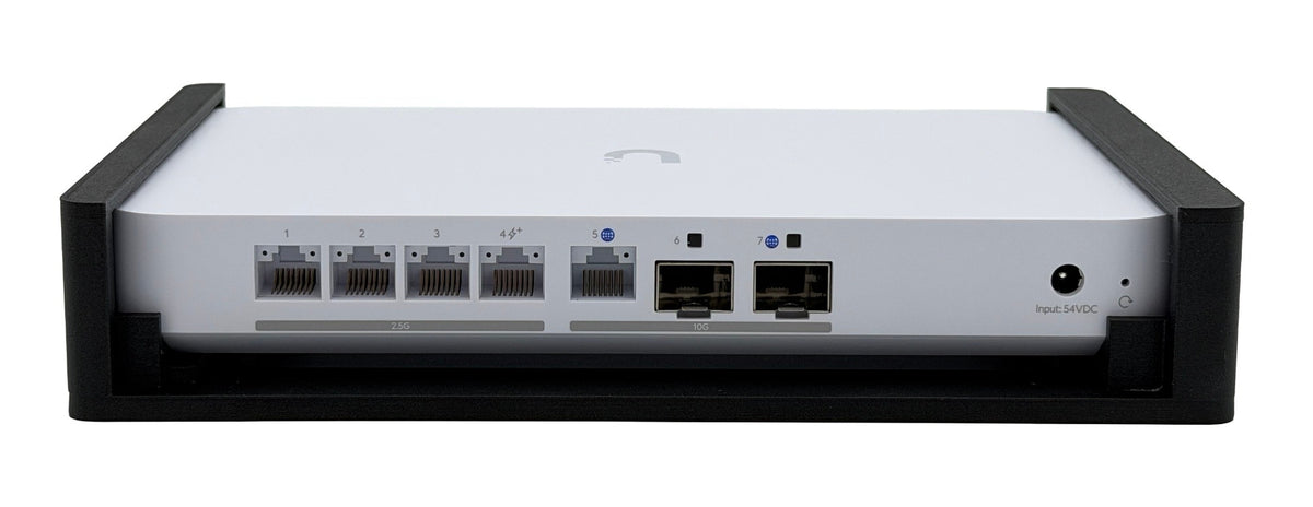 Black HangLab UCG-Fiber mount from the port side: all seven ports and the power input stay open
