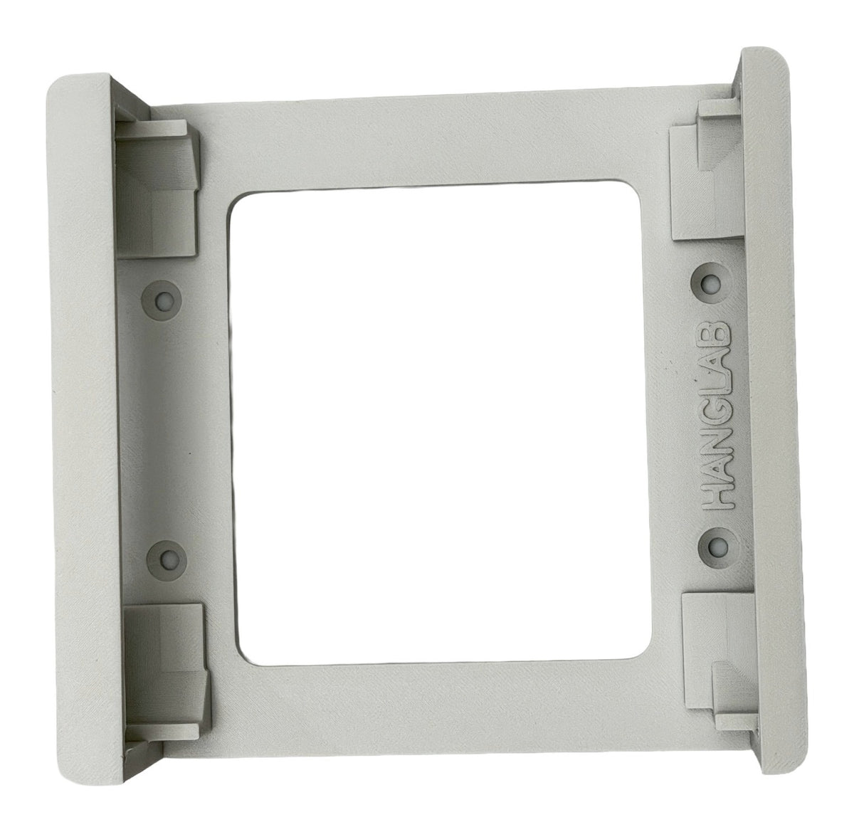 The white HangLab UCG-Max wall bracket on its own, showing the four countersunk screw holes and corner seats